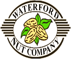 Waterford Nut Company logo with black outline circle with light yellow almond illustration in the center with leaves
