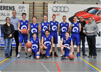 Belgian youth basketball team in team photo with four coaches to left and right side with youth basketball players in two rows with the back row standing and the front row crouching down on one knee with all youth basketball players wearing Q from QCIFY logo as sponsor on front of  dark blue and white jersey